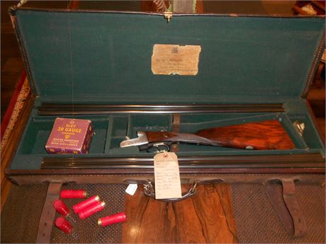 A CASED 20 BORE SIDE BY SIDE WITH TWO SETS OF BARRELS BY W.R. LEESON