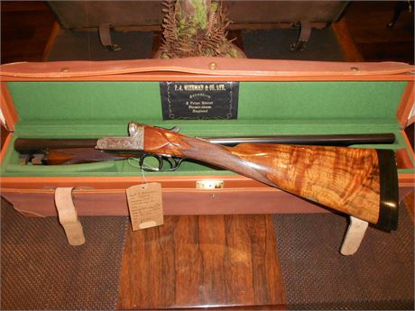 A WORLD CLASS SIDE BY SIDE CASED 12 BORE GAME GUN BY F.J. WISEMAN